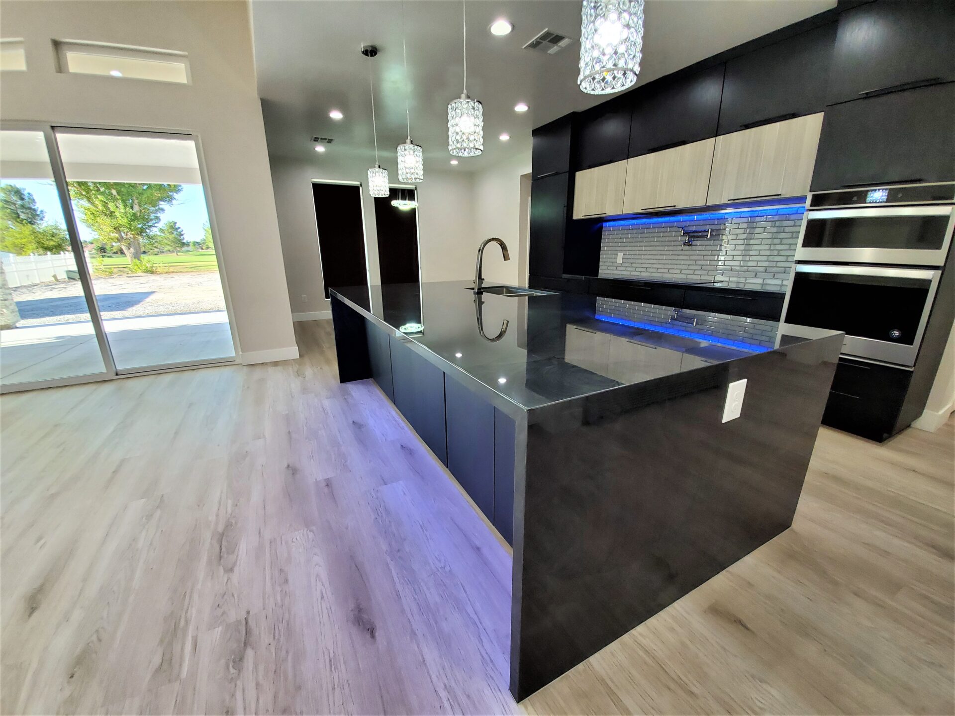 A custom designed kitchen with lights