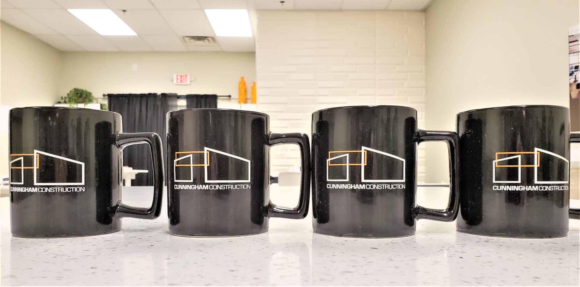 Four custom made cups in black color