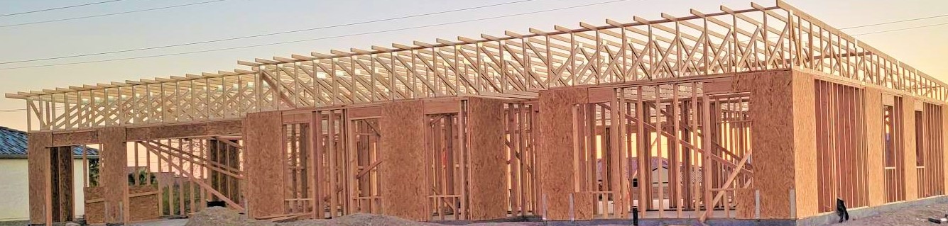 A wooden base for a building at a construction site